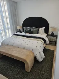 Furnished display suite living area at Remi Residences